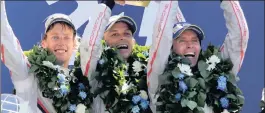 ?? PICTURE: EPA ?? TRIUMPHANT TRIO: Porsche LMP Team of Brendon Hartley, Earl Bamber and Timo Bernhard celebrate winning the Le Mans 24-Hour race yesterday.
