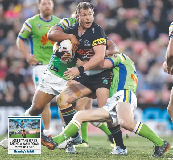  ?? Picture: RYAN PIERSE/GETTY IMAGES ?? Penrith forward Trent Merrin takes on the Canberra defence in yesterday’s 40-31 win at Panthers Stadium.