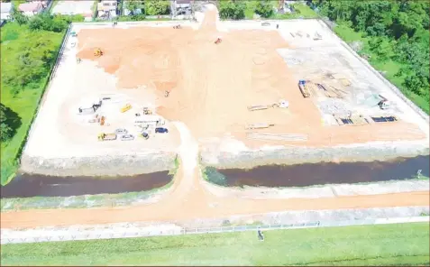  ?? (Image taken from www.caribosl.com) ?? An aerial view of the Falcon Logistics operation during the constructi­on phase.