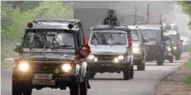  ?? - PTI ?? ON HIGH ALERT: Indian Army vehicles move towards border areas in Akhnoor sector on India Pakistan Border at Akhnoor about 35km from Jammu on Friday.