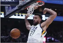  ?? THE ASSOCIATED PRESS — 2022 ?? The Utah Jazz sent center Rudy Gobert to the Minnesota Timberwolv­es in a deal that includes five first-round picks.