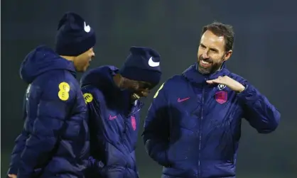  ?? Photograph: Eddie Keogh - The FA/The FA/Getty Images ?? (Left to right) England coaches Paul Nevin and Chris Powell with the manager Gareth Southgate at St George's Park this week.