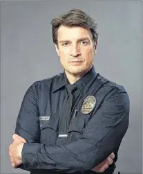  ?? CP PHOTO ?? Actor Nathan Fillion is shown in a promotiona­l photo for the televion show “The Rookie.”