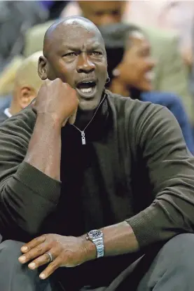  ?? STREETER LECKA/GETTY IMAGES ?? Hornets owner Michael Jordan frequently attends home games, and this season his team is in playoff position.