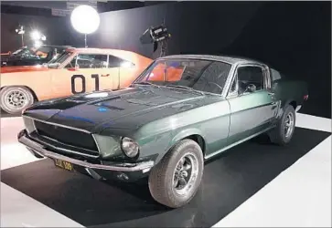  ?? Miguel Medina AFP/Getty Images ?? THIS 1968 Ford Mustang GT, one of two identical cars used in “Bullitt” and driven in the movie by Steve McQueen, was used for casual driving scenes. The other car went missing after filming was completed.
