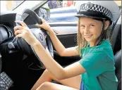  ?? ?? Abbie Ransome, aged 10, in police car