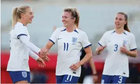  ?? Photograph: Fran Santiago/The FA/Getty Images ?? Lauren Hemp (No 11) is congratula­ted by Alex Greenwood after her second goal puts England 3-0 ahead.