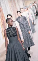  ??  ?? Models parade for Christian Dior.