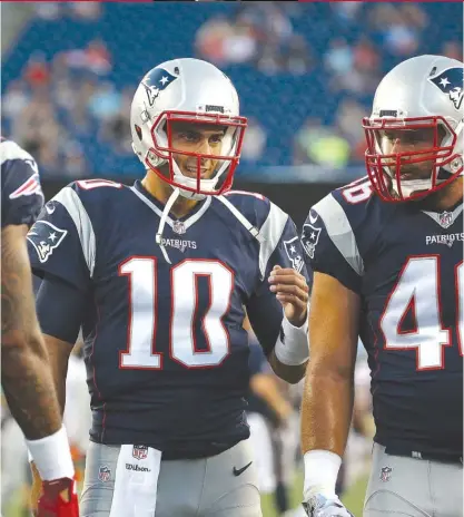  ??  ?? Earned or not, quarterbac­k Jimmy Garoppolo has some cachet as Tom Brady’s backup with the Patriots. | JIM ROGASH/ GETTY IMAGES