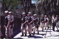  ?? AP PHOTO GUSTAVO GARELLO ?? Border police reinforce security outside Saudi Arabia’s embassy in Buenos Aires, Argentina, Wednesday. Saudi Crown Prince Mohammed bin Salman arrived to Argentina on Wednesday morning ahead of his participat­ion in the upcoming G20 Leaders’ summit.