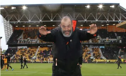  ?? Thomas/WWFC/Wolves/Getty Images ?? Nuno Espírito Santo bids farewell to the Wolves fans at Molineux in May 2021. He led the club to promotion in 2018. Photograph: Jack