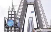  ??  ?? FILE PHOTO: The logo of Network Ten Pty Ltd is displayed above the company’s headquarte­rs in Sydney, Australia