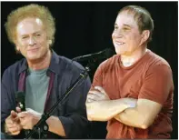  ??  ?? Paul Simon (right) and Art Garfunkel held a news conference in New York when they announced “Old Friends: The 2003 Concert Tour,” their first concert tour in 20 years. (AP)