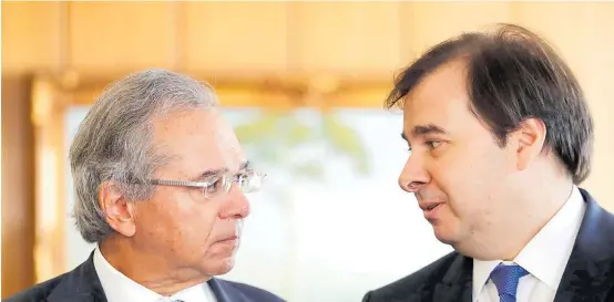  ?? GABRIELA BILO / ESTADÃO-21/08/2019 ?? Divergênci­as. Ministro Paulo Guedes e deputado Rodrigo Maia têm histórico de embates; o mais recente envolve um fundo de desenvolvi­mento regional