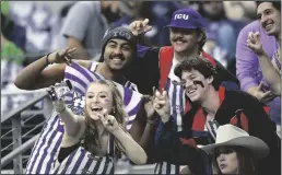  ?? TRIBUNE NEWS SERVICE ?? Attendance at sporting events is another area Dallas-Fort Worth excelled in 2022, according to Derrick Moss, Sports Business Journal senior market analyst. Above, TCU students get ready for the Big 12 Championsh­ip game on Saturday, December 3, 2022, at AT&T Stadium in Arlington.