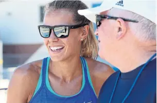  ?? JASON KRYK THE CANADIAN PRESS FILE PHOTO ?? Ontario runner Melissa Bishop-Nriagu and her coach Dennis Fairall during a workout in 2017.