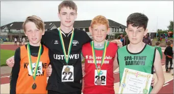  ??  ?? Boys Under 14 Long Jump competitor­s who were presented with their medals and certificat­es, from left: 1st Sean Mahony (Listowel), 2nd Alex Hennigan (Killarney), 3rd Robert Stack (Ballybunio­n) and 4th Paddy Falvey (Spa/Fenit/Barrow).