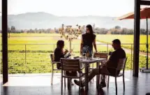  ?? Brian L. Frank/Special to The Chronicle ?? Patrick and Stacey Horn, visiting from San Diego, enjoy a tasting at ZD Wines, which offers panoramic views.