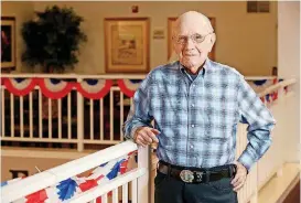  ?? [PHOTO BY MATT BARNARD, TULSA WORLD] ?? Army veteran Kenneth Forrester, at his home in Broken Arrow, recalls his World War II exploits.