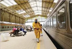  ??  ?? Workers spray disinfecta­nt at a railway station in Cairo, Egypt.
AHMED GOMAA/XINHUA VIA GETTY IMAGES