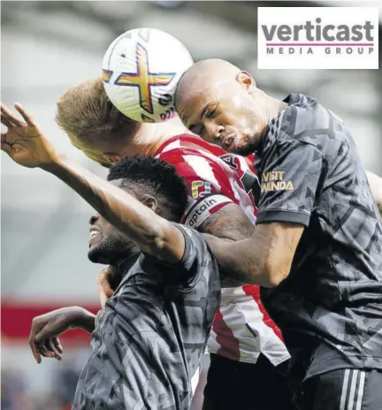  ?? (Photo: AP) ?? Brentford’s Mathias Jensen (centre) goes for the header with Arsenal’s Thomas Partey (left) and his teammate Gabriel during their English Premier League match at the Gtech Community Stadium in London, England on Sunday, September 18.