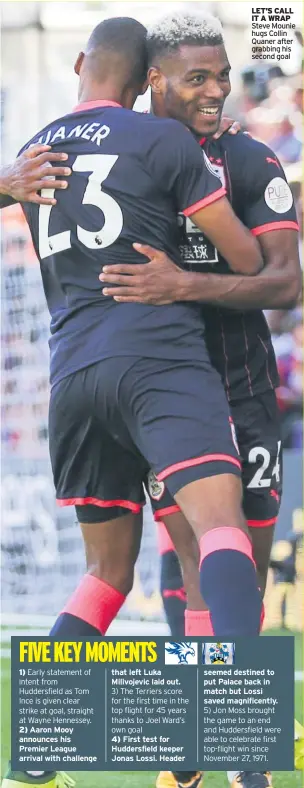  ??  ?? LET’S CALL IT A WRAP Steve Mounie hugs Collin Quaner after grabbing his second goal