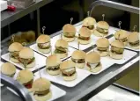  ??  ?? A tray of Mumbai burgers, which are spicy vegetarian offerings.