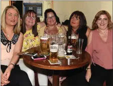  ??  ?? Tommy and Sharon Collins and Sandra Maher and right, Deborah Mullan, Catriona Bagnall, Maria Levins, Janice Hoey and Shirley Brady