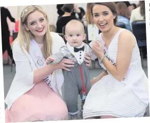  ??  ?? Fainche and Co Clare Rose Leah Kenny with little Oisin O Donnell during the event, and (left) newly crowned Rose of Tralee Maggie McEldowney