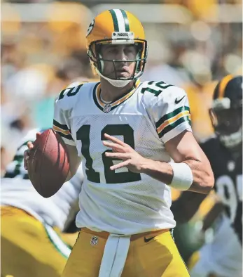  ?? JASON BRIDGE, USA TODAY SPORTS ?? Aaron Rodgers, above, is the reigning MVP but must make do without wideout Jordy Nelson.