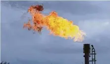  ?? Staff file photo ?? A gas flare burns in La Salle and Dimmit counties. A study shows premature births rise with high amounts of flaring.