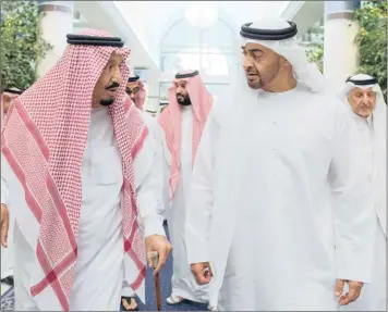  ?? PHOTO: AP ?? Saudi King Salman bin Abdulaziz Al Saud, left, talks to Sheikh Mohammed bin Zayed Al Nahyan, Abu Dhabi’s Crown Prince in Jeddah, Saudi Arabia. Four Arab nations cut diplomatic ties to Qatar early yesterday, deepening a rift among Gulf Arab nations.