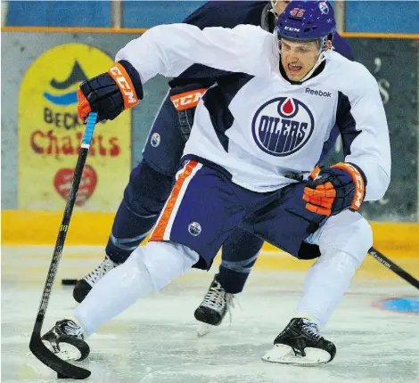  ?? ED KAISER /EDMONTON JOURNAL ?? Leon Draisaitl swings in front of the net as he takes part in the Edmonton Oilers’ annual prospect developmen­t camp.