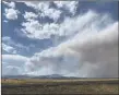  ?? ?? The Hermits Peak-Calf Canyon Fire as seen from I-25 near Las Vegas on Sunday afternoon (May 1).