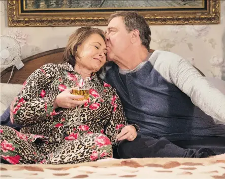  ?? ADAM ROSE/ABC ?? In season 2 of the rebooted series starring Roseanne Barr and John Goodman, the writers hope to revisit the hot-button topics they’ve raised in the first season, such as single parenting, veterans, debt, undocument­ed workers and unions.