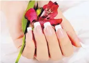  ?? SOURCE: DREAMSTIME ?? Fake nails may not cause harm, but infection is possible.