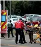  ?? — AP ?? A person is transporte­d from the scene of the shooting in Tallahasse­e, Florida.