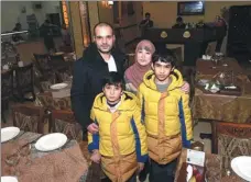  ?? HAN CHUANHAO / XINHUA ?? Mohanad Ali Moh’d Shalabi from Jordan opens the Ward restaurant with his family in Yiwu.