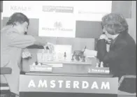  ?? (Photo: Chessbase) ?? Anatoly Karpov and Jan Timman during their 1993 World Championsh­ip Match