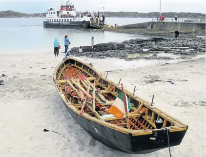  ??  ?? WELCOME ARMS: The ferry to Iona, left; and a statue of St Francis at La Verna