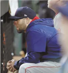  ?? AP PhoTo ?? TOUGH TO SEE: Dustin Pedroia sat out the last two games in Baltimore after being injured Friday, and his status for the series against the Yankees is unknown.