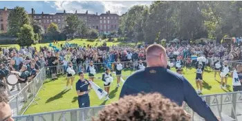  ?? BILL WAGNER/CAPITAL GAZETTE ?? Navy fans attend a pep rally Friday in Dublin’s Merrion Square.