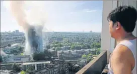  ?? AP ?? Smoke billows from a fire that engulfed the 24storey Grenfell Tower in west London on Wednesday.