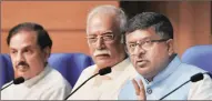  ?? PTI PHOTO ?? Union civil aviation minister Ashok Gajpati Raju, Minister of State for civil aviation Mahesh Chandra Sharma and Union IT and communicat­ions minister Ravi Shankar Prasad during a press conference on the civil aviation policy in New Delhi on Wednesday.