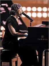  ?? CHRIS PIZZELLO/INVISION ?? Alicia Keys, shown at the 2019 iHeartRadi­o Music Awards, sang from her home Sunday to start the concert.