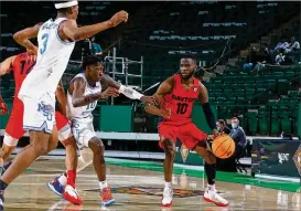  ?? CONTRIBUTE­D BY THE NIT ?? University of Dayton guard Jalen Crutcher ended his Flyers career in a matchup against his hometown team, Memphis, in a first-round NIT game Saturday in Denton, Texas. Crutcher had six points on 3-of-10 shooting in a Flyers loss.