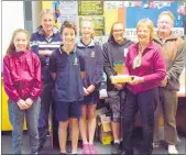  ?? PHOTO: SUPPLIED ?? The CHB Camera Club donating a cheque and the Aly Zurcher Trophy to the CHB Technology Centre. From left, Grace (Pukehou School), Arie Groenveld (head of technology), Tom and Ella (Waipawa School), Sofia (Pukehou School), and Robyn Gichard and Wayne Johnson (CHB Camera Club).