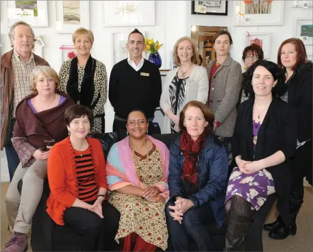  ??  ?? Jonathan Wogan pictured with some of the craftspeop­le when they launched the Louth Craftmark at Wogan Interiors.