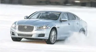  ?? JAGUAR ?? Jaguar’s all-wheel-drive prototype is shown in developmen­t testing at Jaguar Land Rover proving ground in Sweden. Jaguar forecasts the U.S. to account for 75 percent of AWD sales.