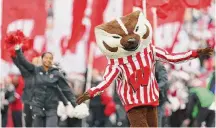  ?? Stacy Revere/Getty Images ?? Wisconsin Badgers mascot Bucky Badger leads the team onto the field for a game with the Iowa Hawkeyes in Madison, Wis.